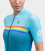 Women's light blue cycling jersey with rainbow stripes and geometric pattern