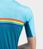 ALE women's cycling jersey in light blue with rainbow stripe and geometric pattern