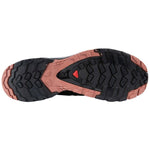 Salomon XA Wild women's trail running shoe sole in black and coral