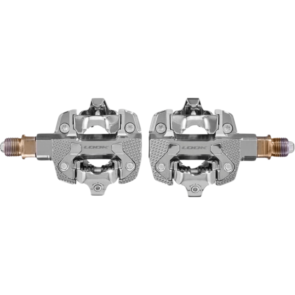 Look X-Track Power Single clipless pedals in silver with bronze spindle on white background