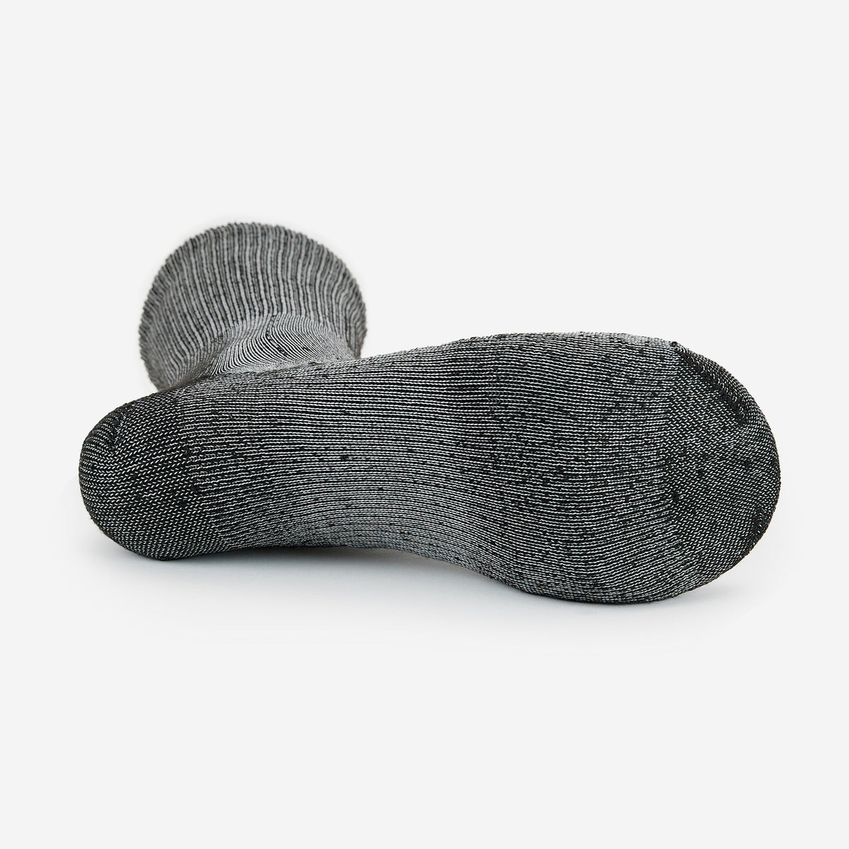Thorlos hiking crew sock in grey shown from sole view with cushioned bottom