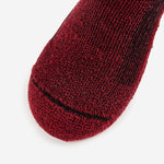 Thorlos hiking low cut sock in burgundy with black toe seam detail on white background
