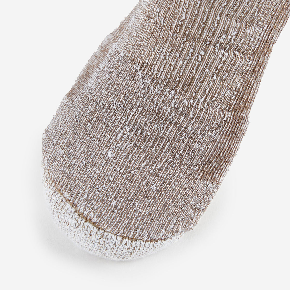 Close-up of Thorlos hiking sock toe in walnut heather brown and white blend