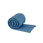 Sea To Summit Pocket Towel in blue color, rolled and partially unfolded