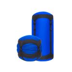 Sea To Summit blue compression sacks in two sizes with black straps