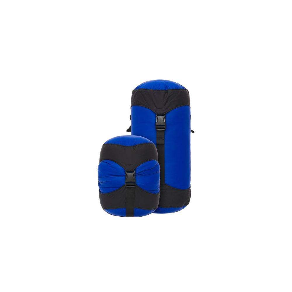 Two Sea To Summit blue and black compression sacks in different sizes