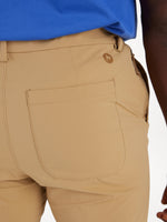 Tan Marmot Arch Rock convertible pants showing back pocket detail and Marmot logo