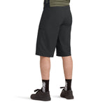 Black Dakine Vectra mountain bike shorts worn by model showing back view