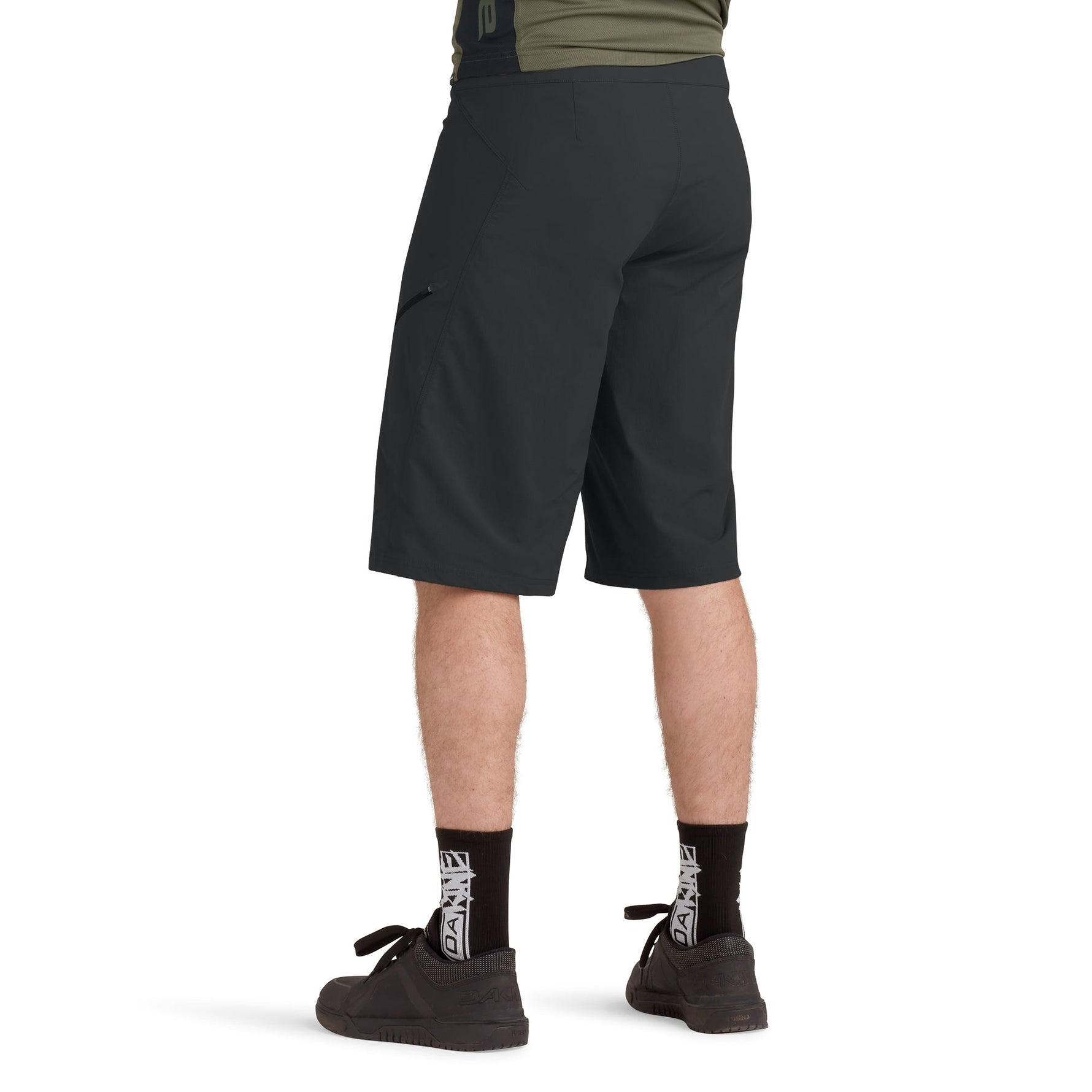 Black Dakine Vectra mountain bike shorts worn by model showing back view