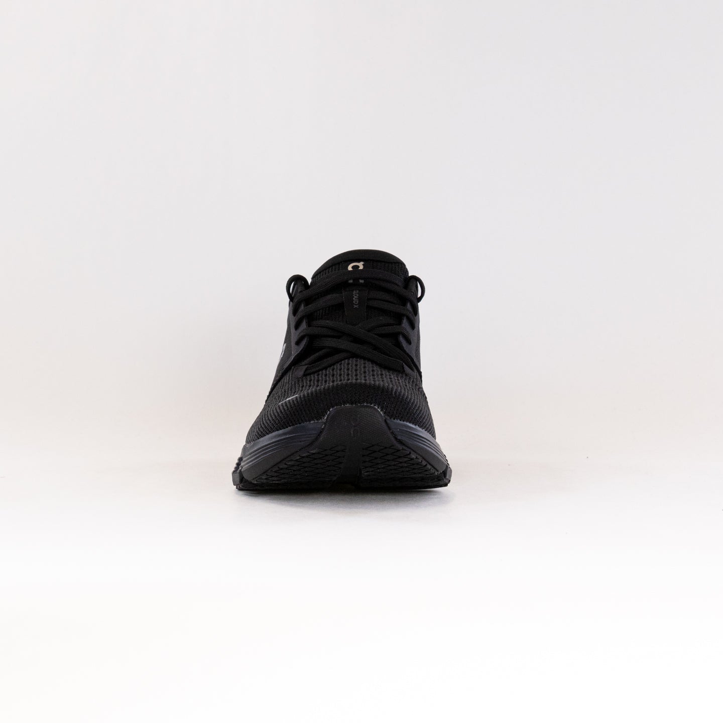 On Cloud X 4 running shoe in black and eclipse colorway front view