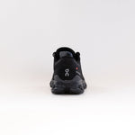 On Cloud X 4 running shoe in black and eclipse colorway, rear heel view