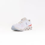 On Cloud X 4 women's running shoe in ivory white with salmon coral accents