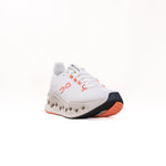 On Cloudsurfer Max women's running shoe in white with orange accents