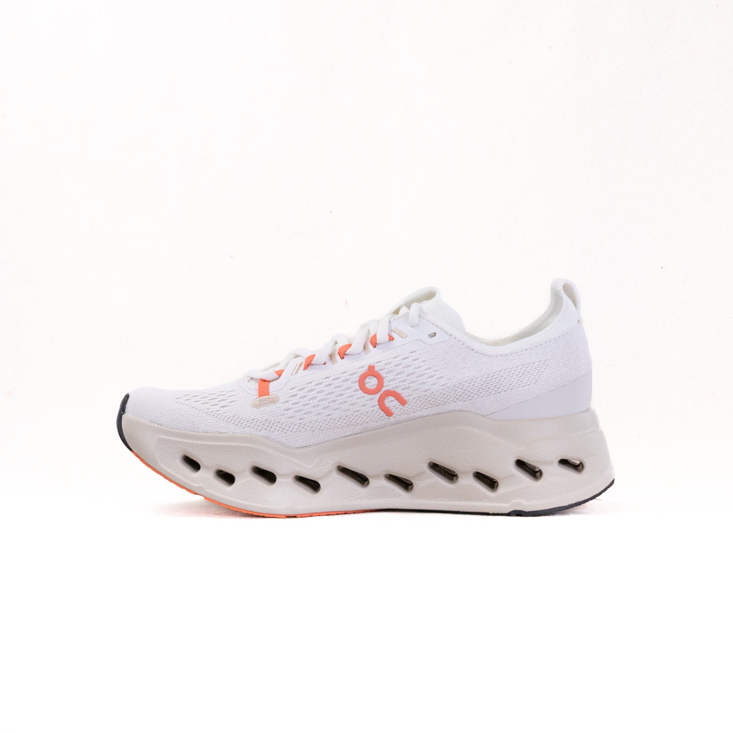 On Cloudsurfer Max women's running shoe in white with coral orange accents