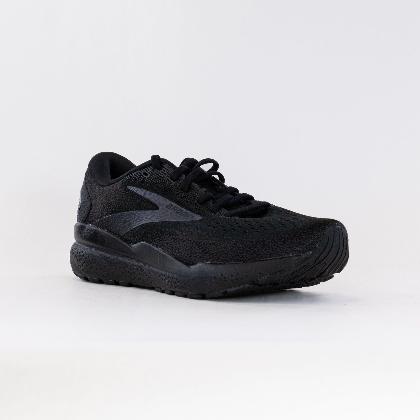Brooks Ghost 16 men's running shoe in all-black colorway on white background