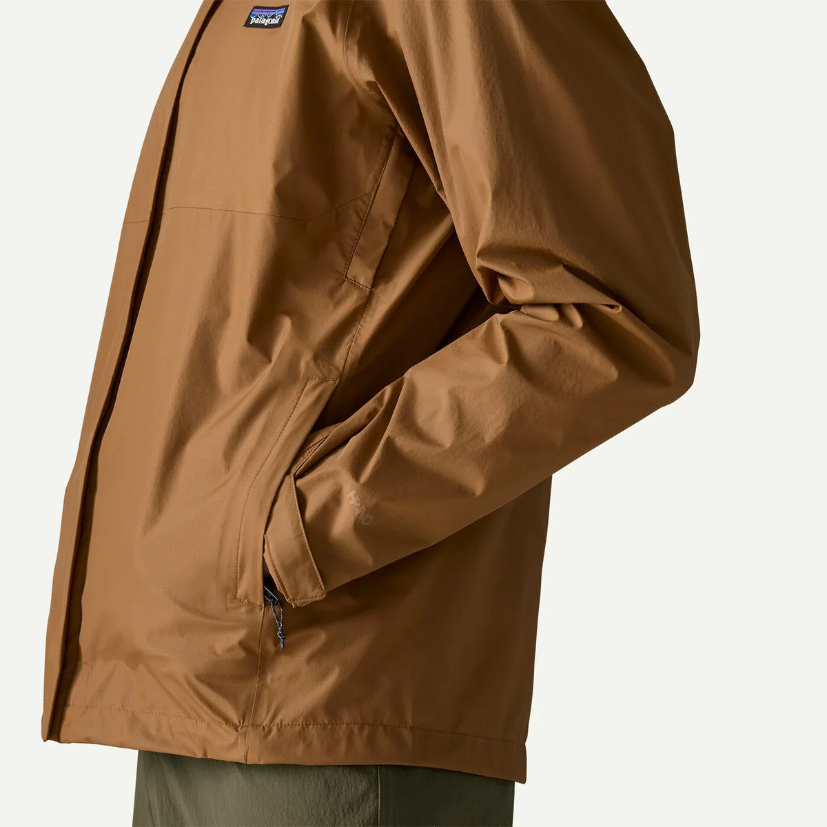 Patagonia Torrentshell 3L Jacket Deer Brown close-up detail of side pocket and hem
