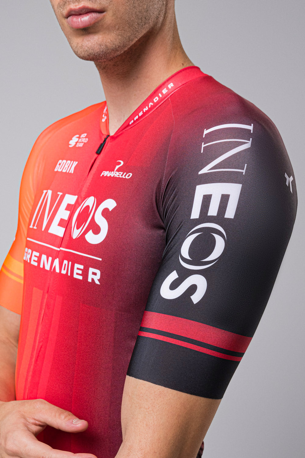 Gobik cycling jersey in INEOS Grenadiers red and black gradient colorway with team branding