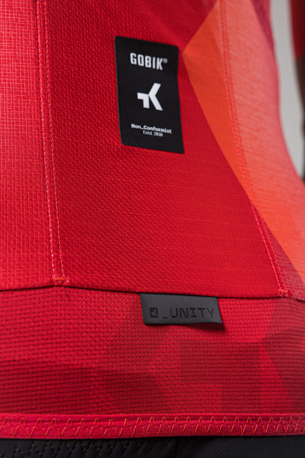 Gobik Carrera 2.0 Short Sleeve Jersey in Cherry red color showing brand details