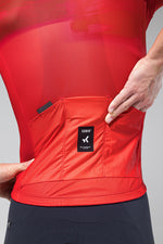 Gobik Stark red cycling jersey showing rear pocket detail with brand label