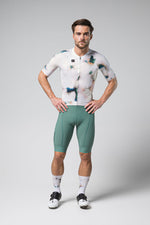 Gobik CX Pro cycling jersey with artistic watercolor pattern in white and blue-green tones