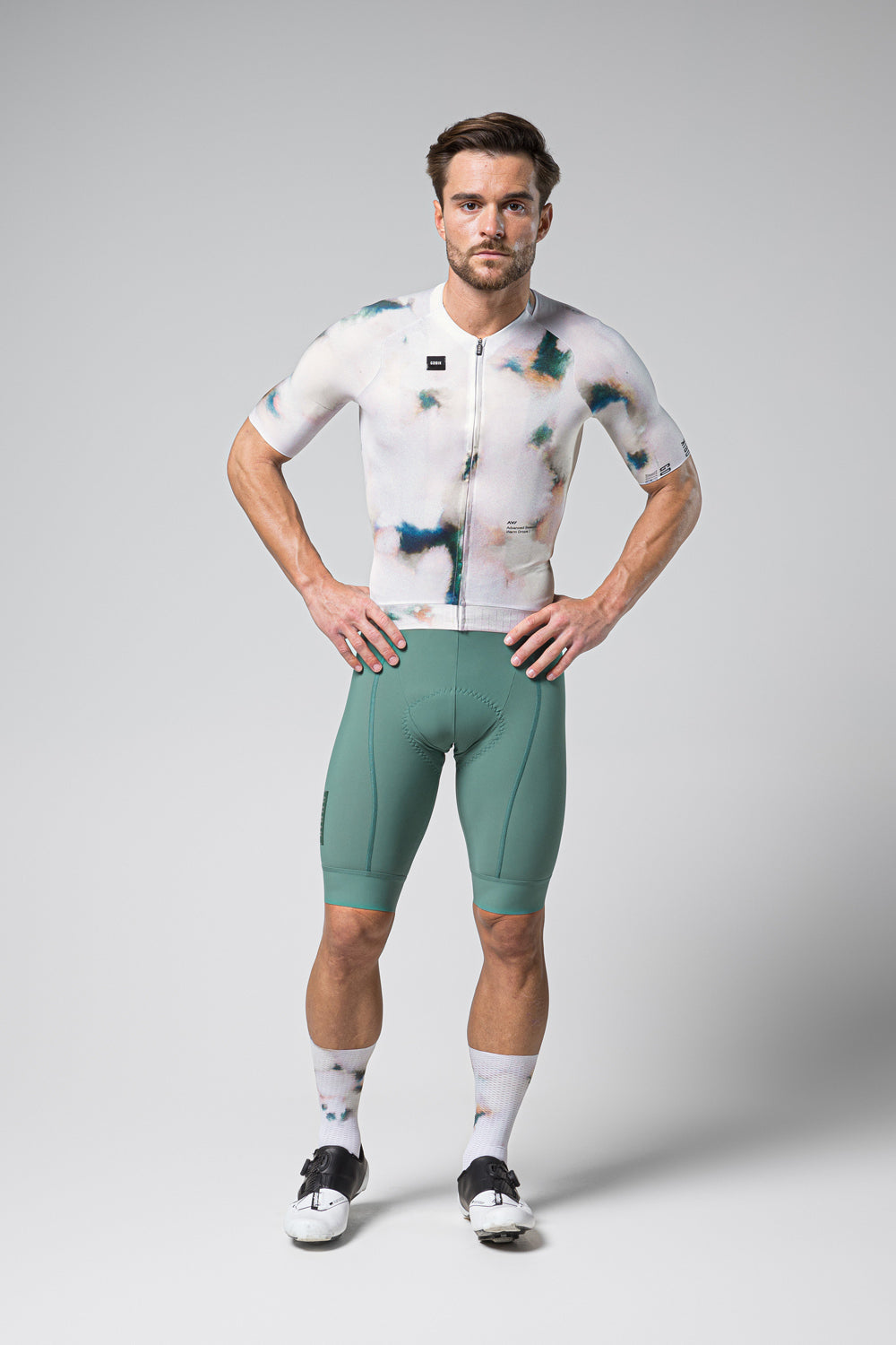 Gobik CX Pro cycling jersey with artistic watercolor pattern in white and blue-green tones