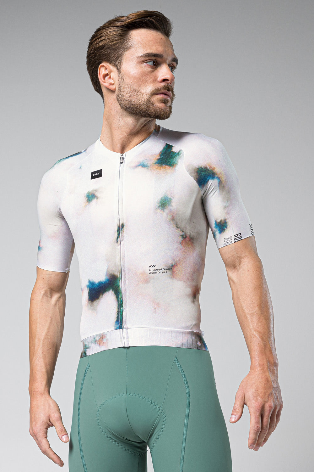Gobik CX Pro cycling jersey with abstract watercolor pattern on white background