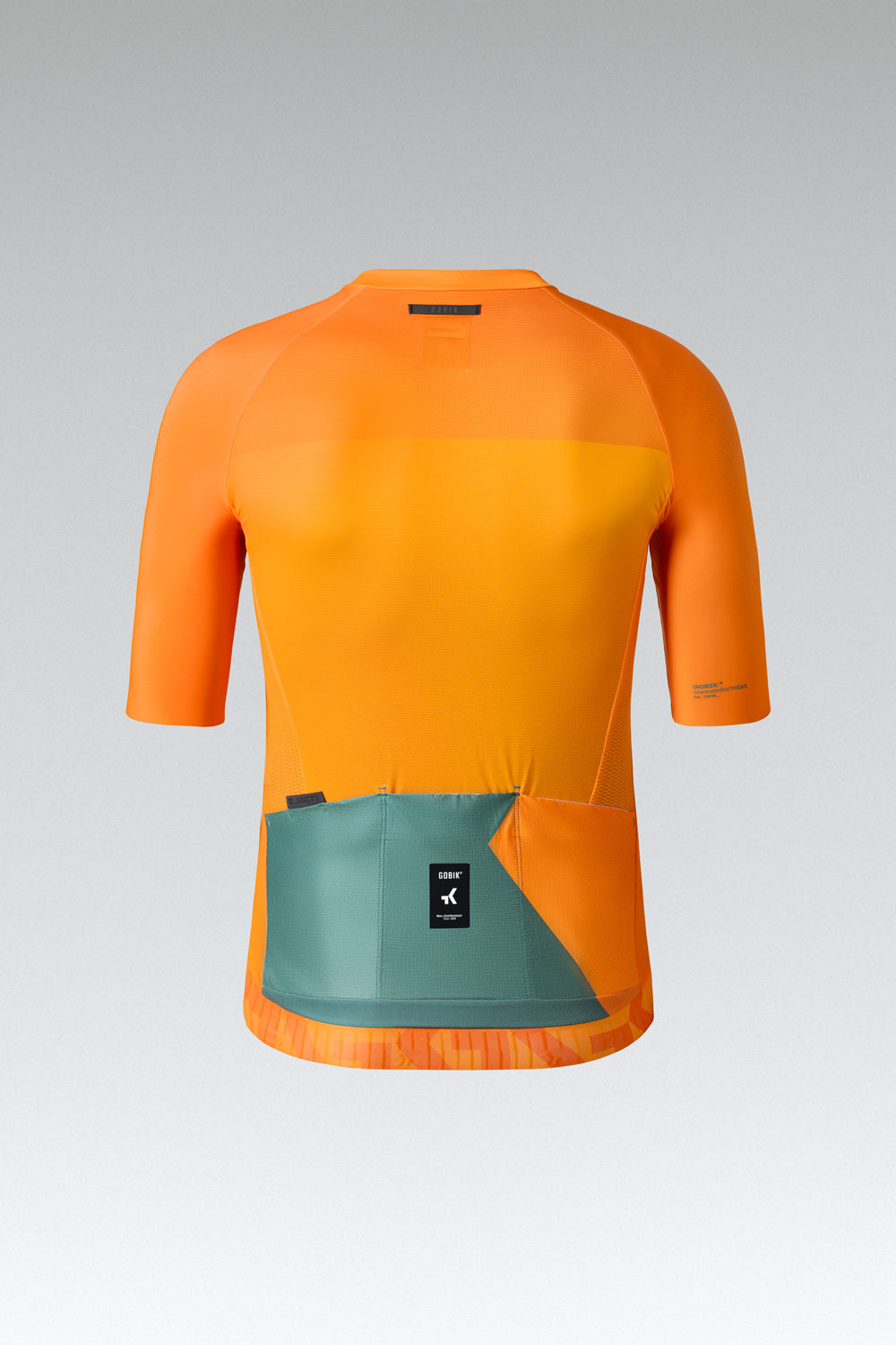 Gobik CX Pro cycling jersey in vibrant orange tangerine with teal pocket detail