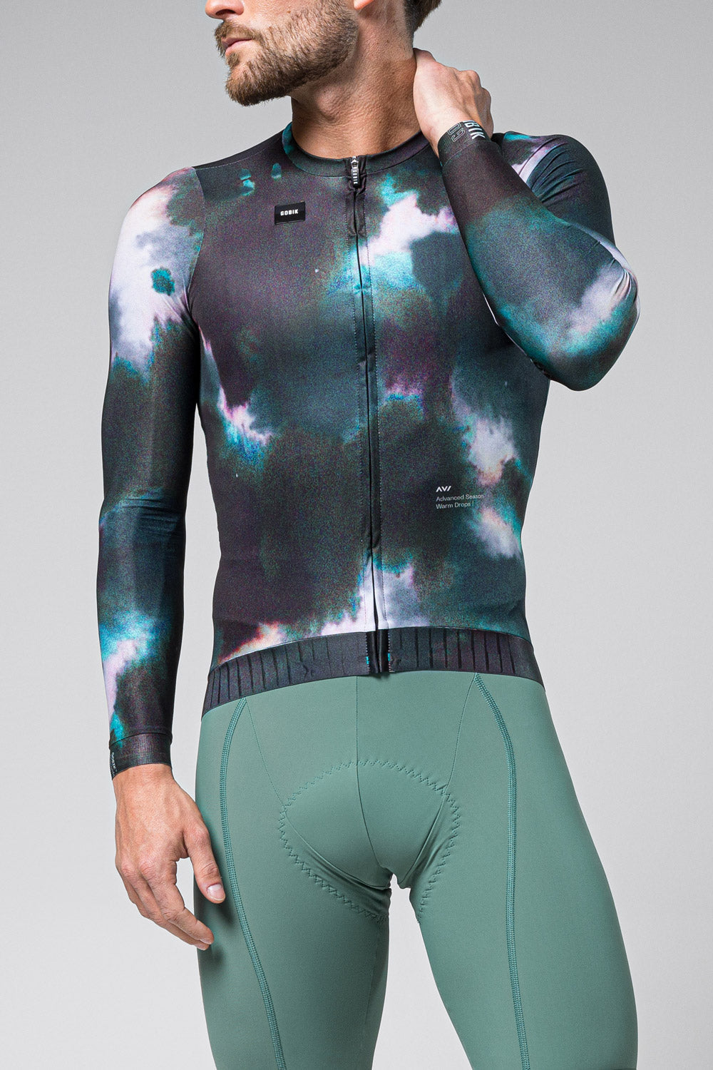 Man wearing Gobik CX Pro cycling jersey with cosmic galaxy print pattern