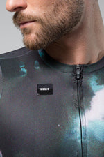 Man wearing Gobik CX Pro long sleeve cycling jersey in galaxy Leda colorway