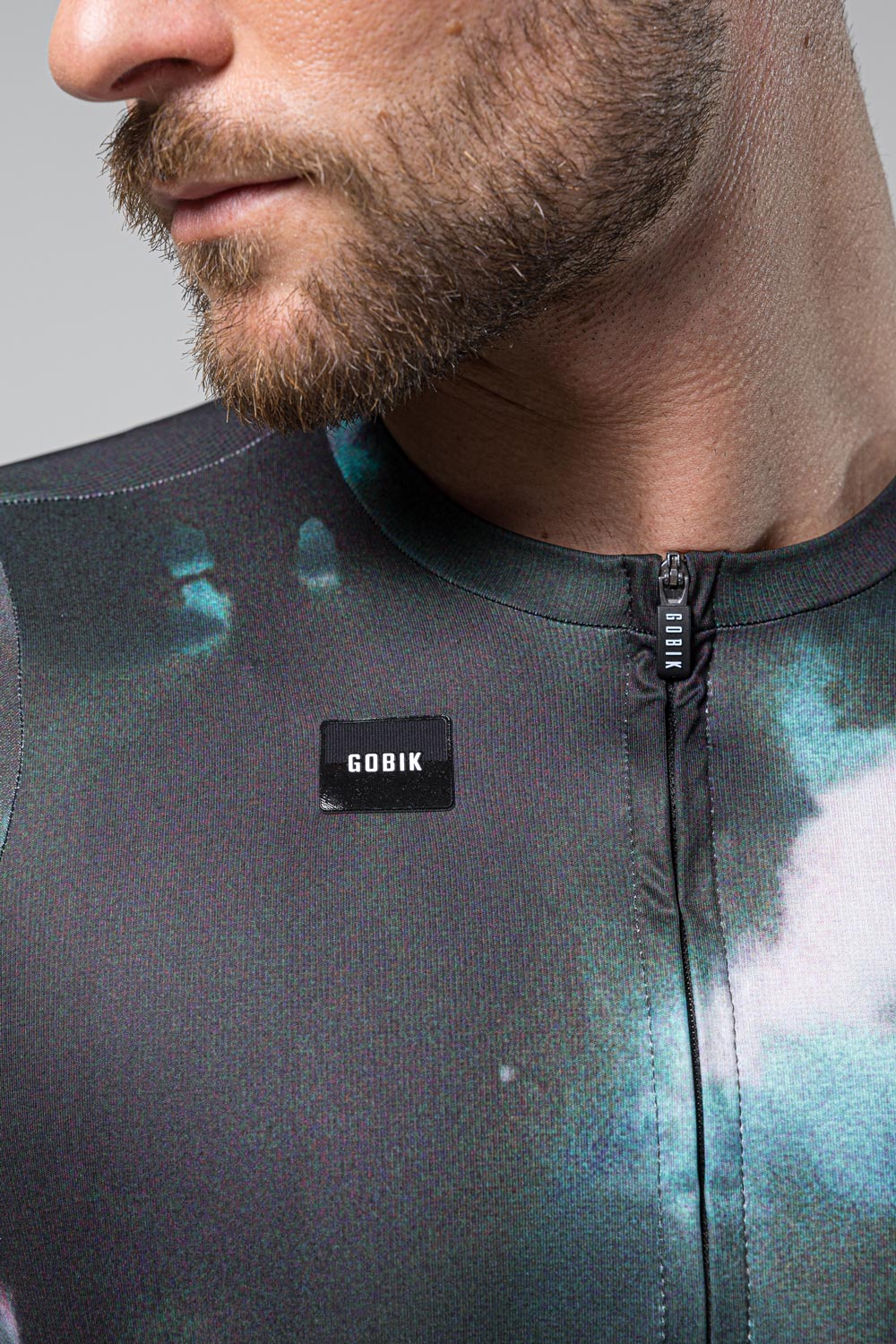 Man wearing Gobik CX Pro long sleeve cycling jersey in galaxy Leda colorway