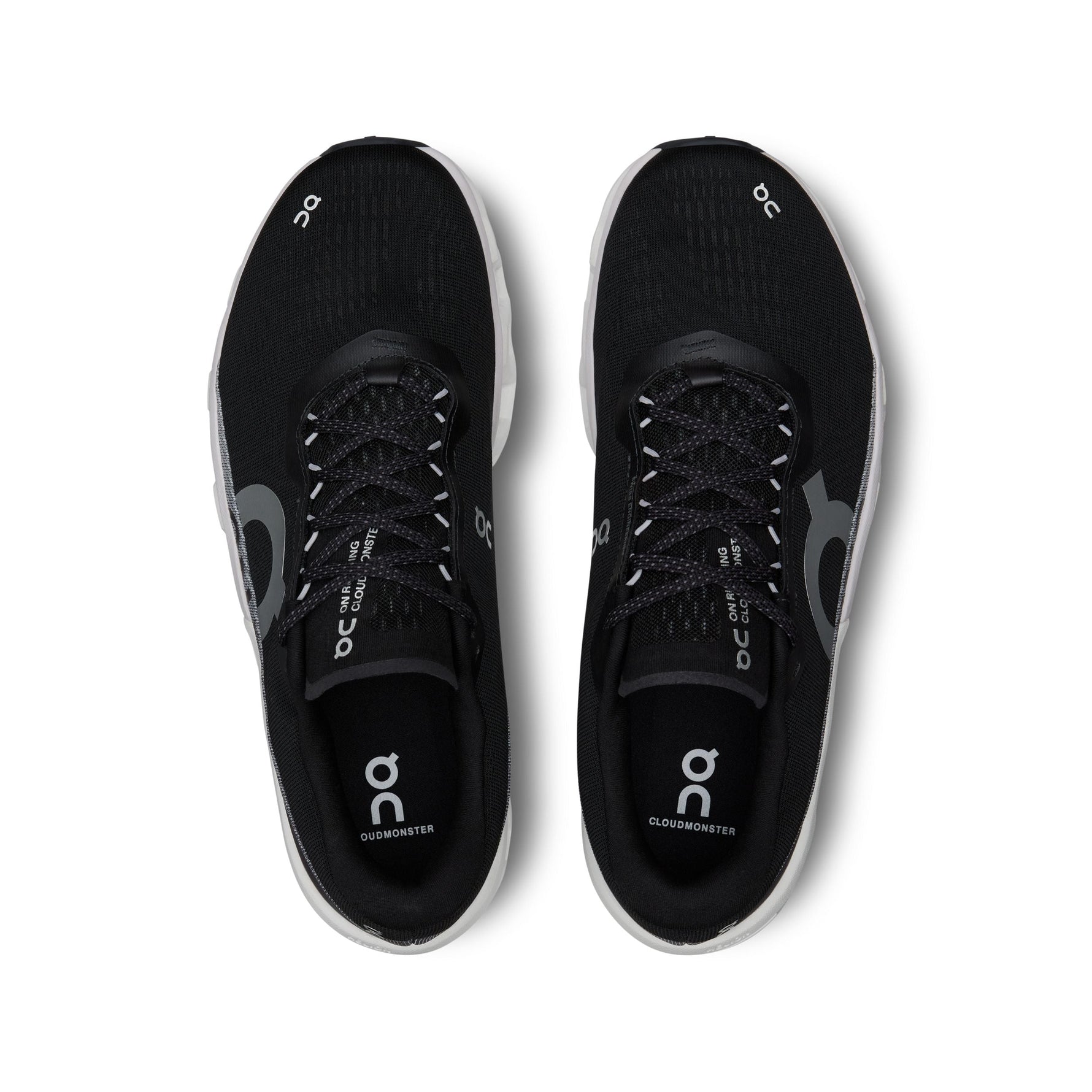 On Cloudmonster 2 running shoes in black with grey details, top view
