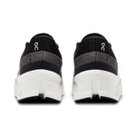 On Cloudmonster 2 running shoes in black and frost colorway, rear view