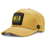 Yellow Miami trucker hat with MIA airport code patch and perforated panels