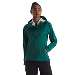 Woman wearing The North Face Venture 2 jacket in blue wing teal color