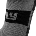 Close-up of grey and black LEGG running socks showing brand logo detail