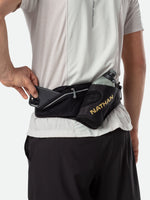Nathan Peak Hydration Waist Pack in black worn around waist with phone storage