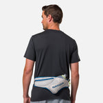 Nathan Peak Hydration Waist Pack in Vapor Grey/Sailor Blue worn by male runner from behind