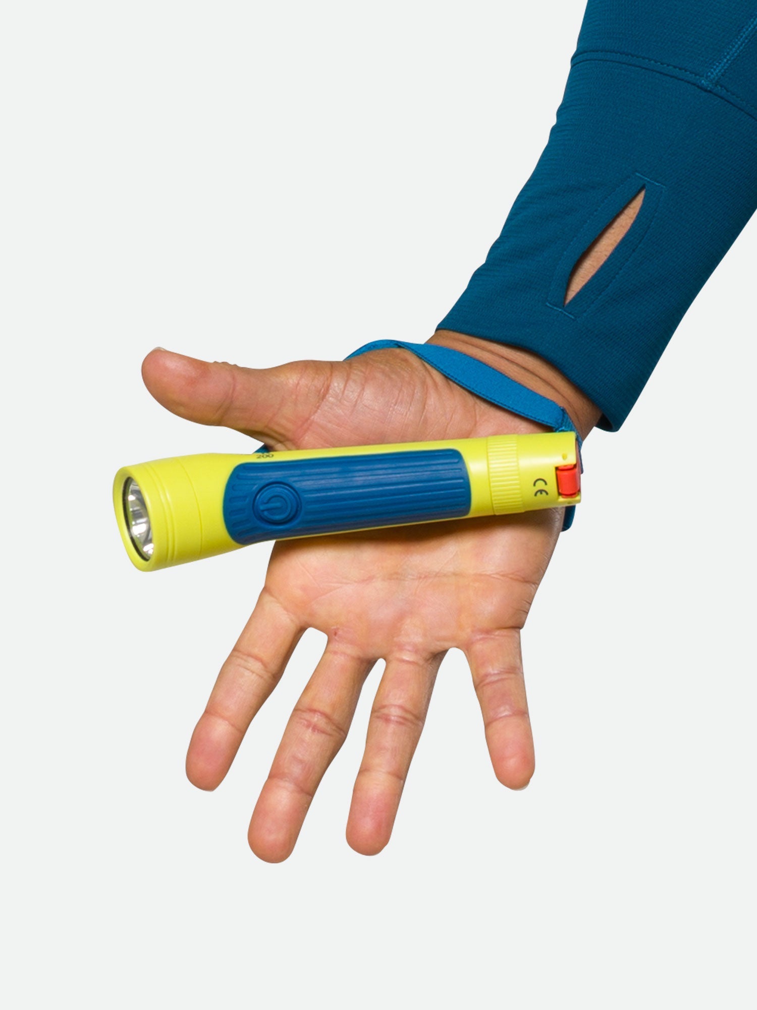 Nathan Polaris 200 R runner's hand torch in safety yellow held in open palm