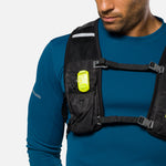 Nathan safety yellow LED strobe light clipped to black running vest chest strap