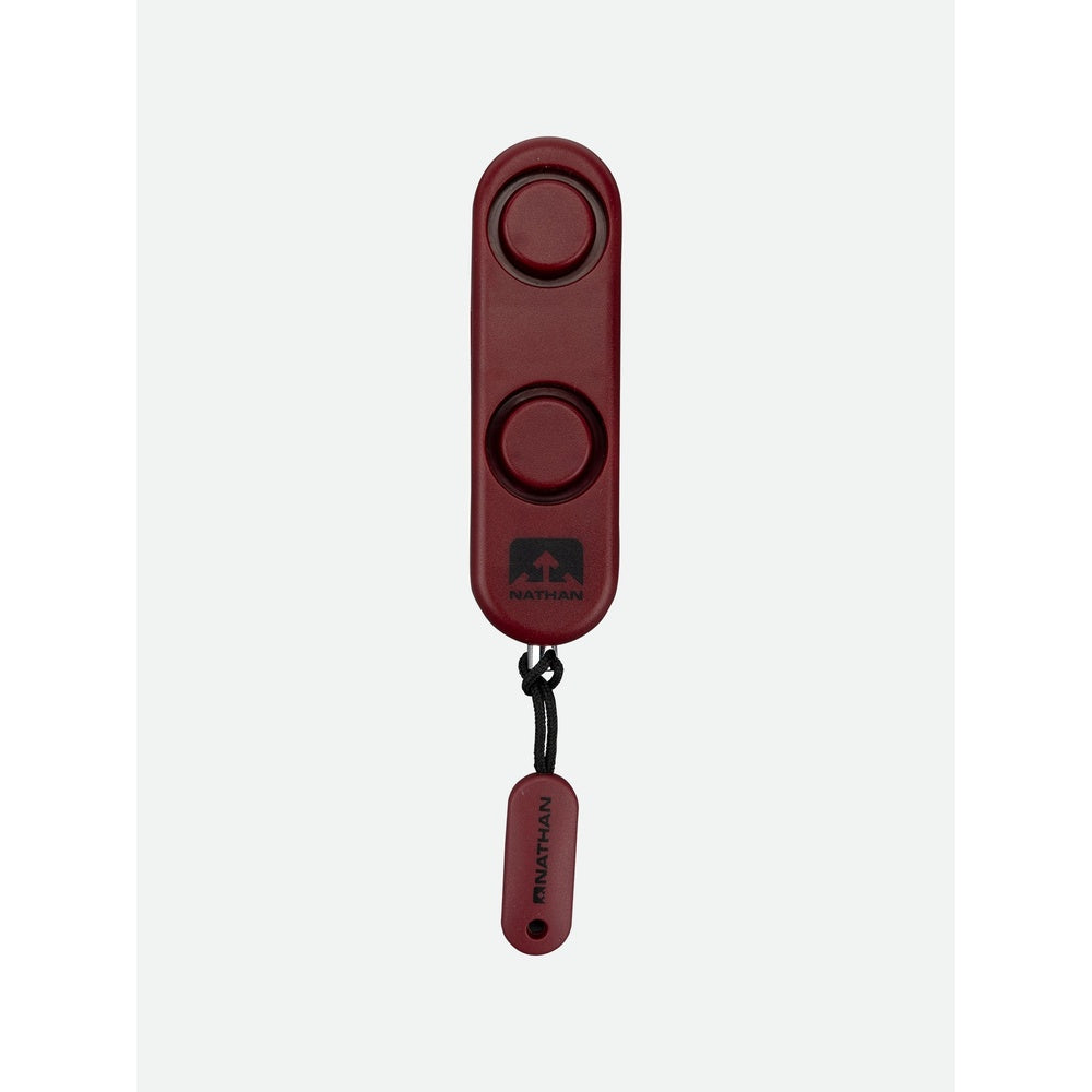 Nathan SaferRun Ripcord personal alarm device in red with two buttons and lanyard