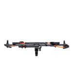 Kuat NV 2.0 bike rack in black metallic with orange accents, studio shot