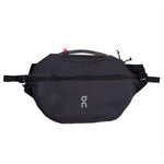 On Sling Pack 9L in Magnet Black with adjustable strap and front zipper pocket