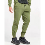 On brand men's sweat pants in taiga green with matching pullover, professional studio shot