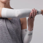 White OS1st performance compression arm sleeves worn by person in athletic wear