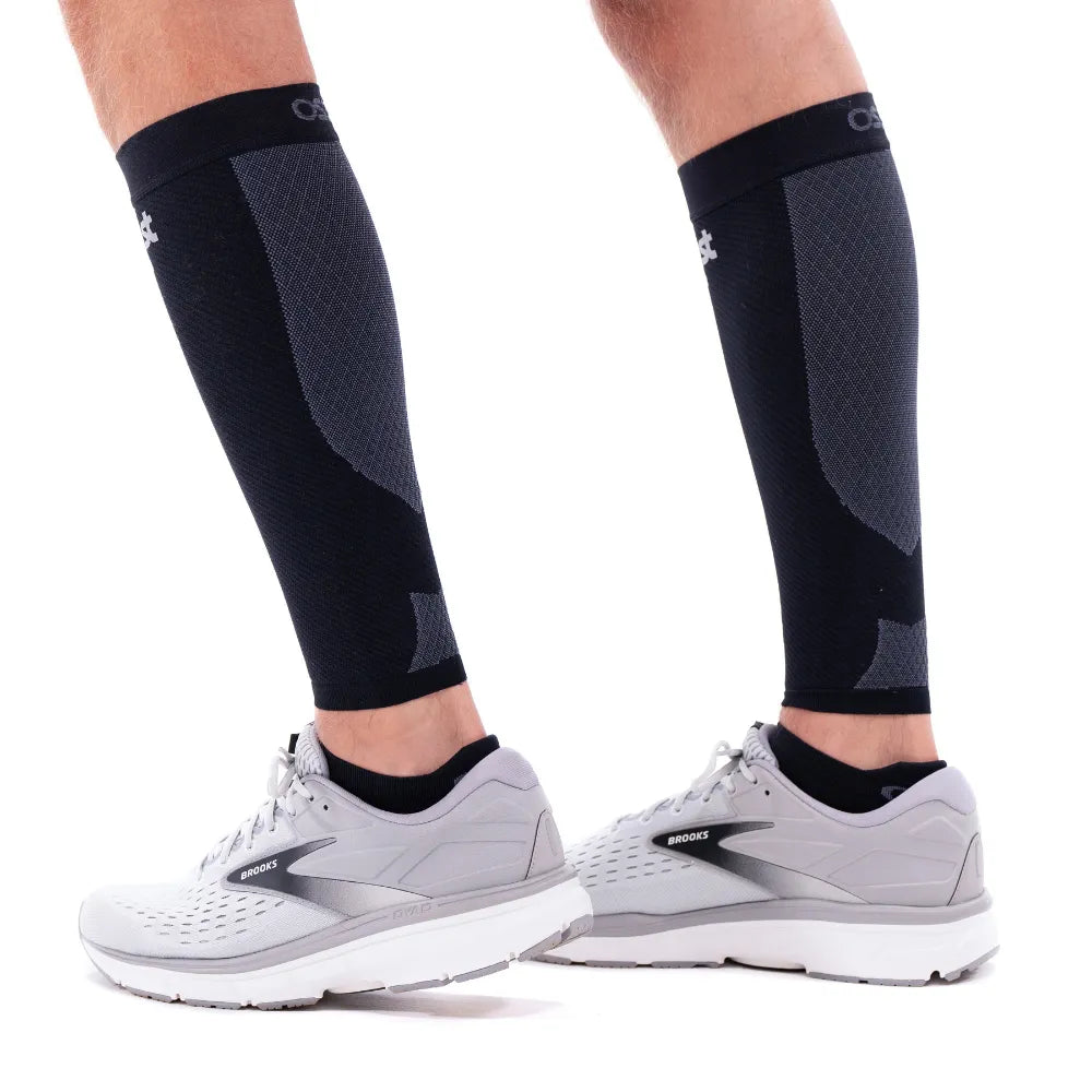 OS1st CS6 Performance Calf Sleeves in black worn on legs with running shoes