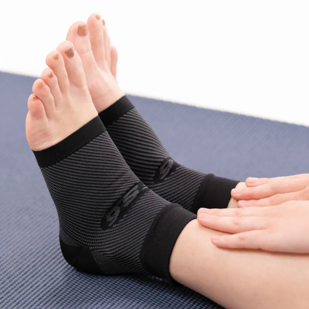 OS1ST FS6 Performance Foot Sleeves in white with compression design and brand logo