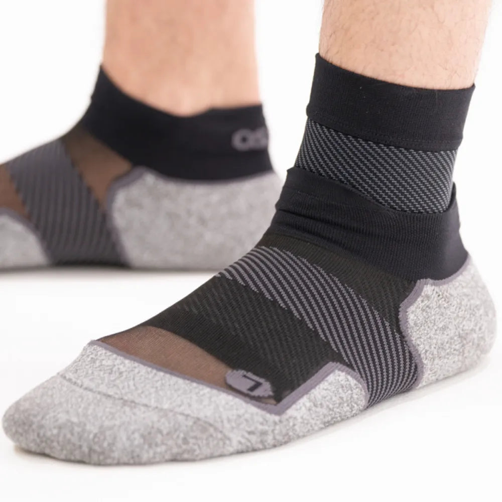 OS1ST FS6 Performance Foot Sleeves in white with compression zones and brand logo