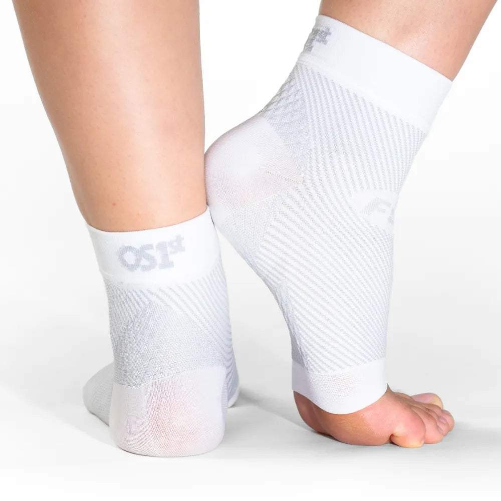 OS1ST FS6 white performance foot compression sleeves worn on feet, open toe design