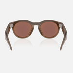 Oakley Meta HSTN sunglasses in brown translucent frame with polarized lenses, rear view