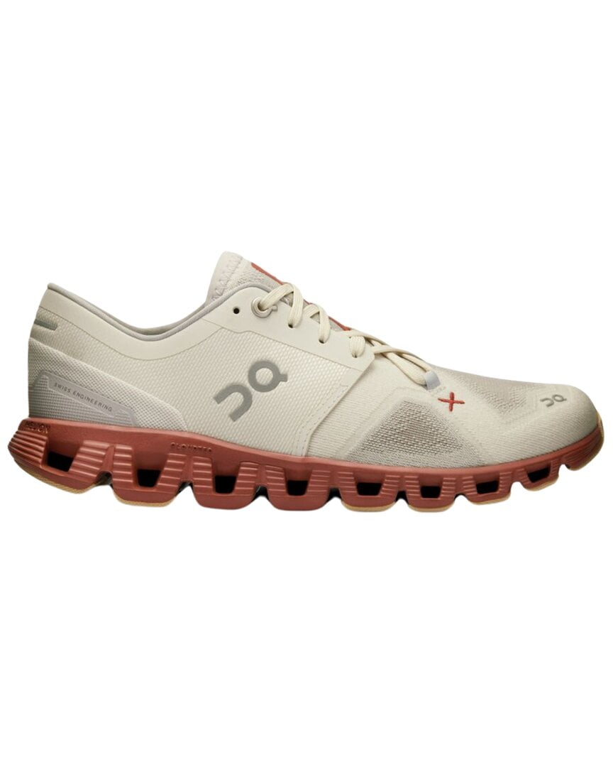 On Cloud X 3 women's running shoe in ice and auburn colorway
